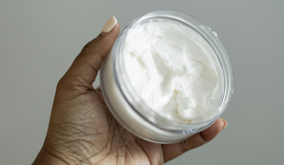 Whipped body butter in a cosmetic jar